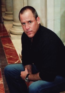 Vince-Flynn-seated-at-pillars