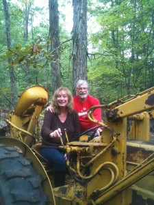 Gayle & John on John's backhoe